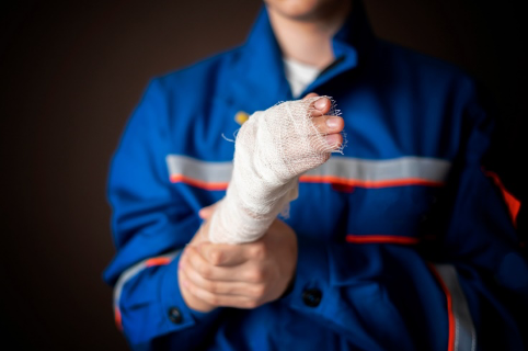 Image of someone with a bandaged arm