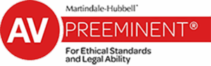 AV Preeminent logo, red and white, highlighting top-rated legal excellence and peer recognition.