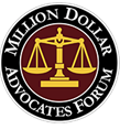 Million Dollar Advocates Forum logo featuring balanced scales of justice on a circular background.
